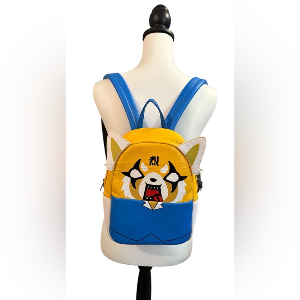Funko Aggretsuko by Sanrio NWOT Yellow and Blue Animal Face Backpack